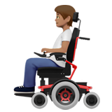 person in motorized wheelchair: medium skin tone apple emoji png image